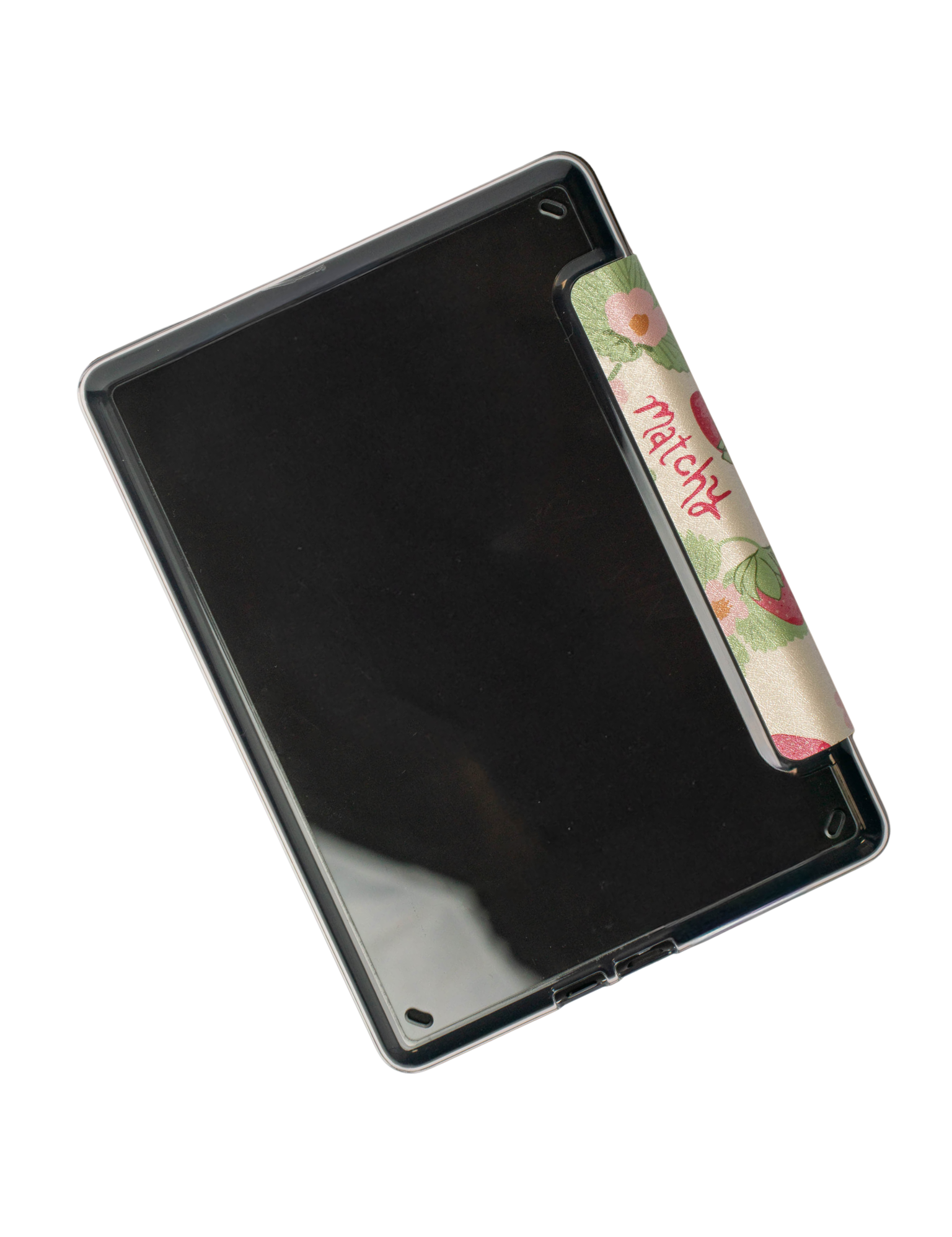 Back of a Kindle case showing the clear plastic shell and a strawberry print spine with 'matchy' written in script. Kindle Cover with Vegan Leather. Matchy Kindle cover for 6.8 inch Kindle with plastic back.