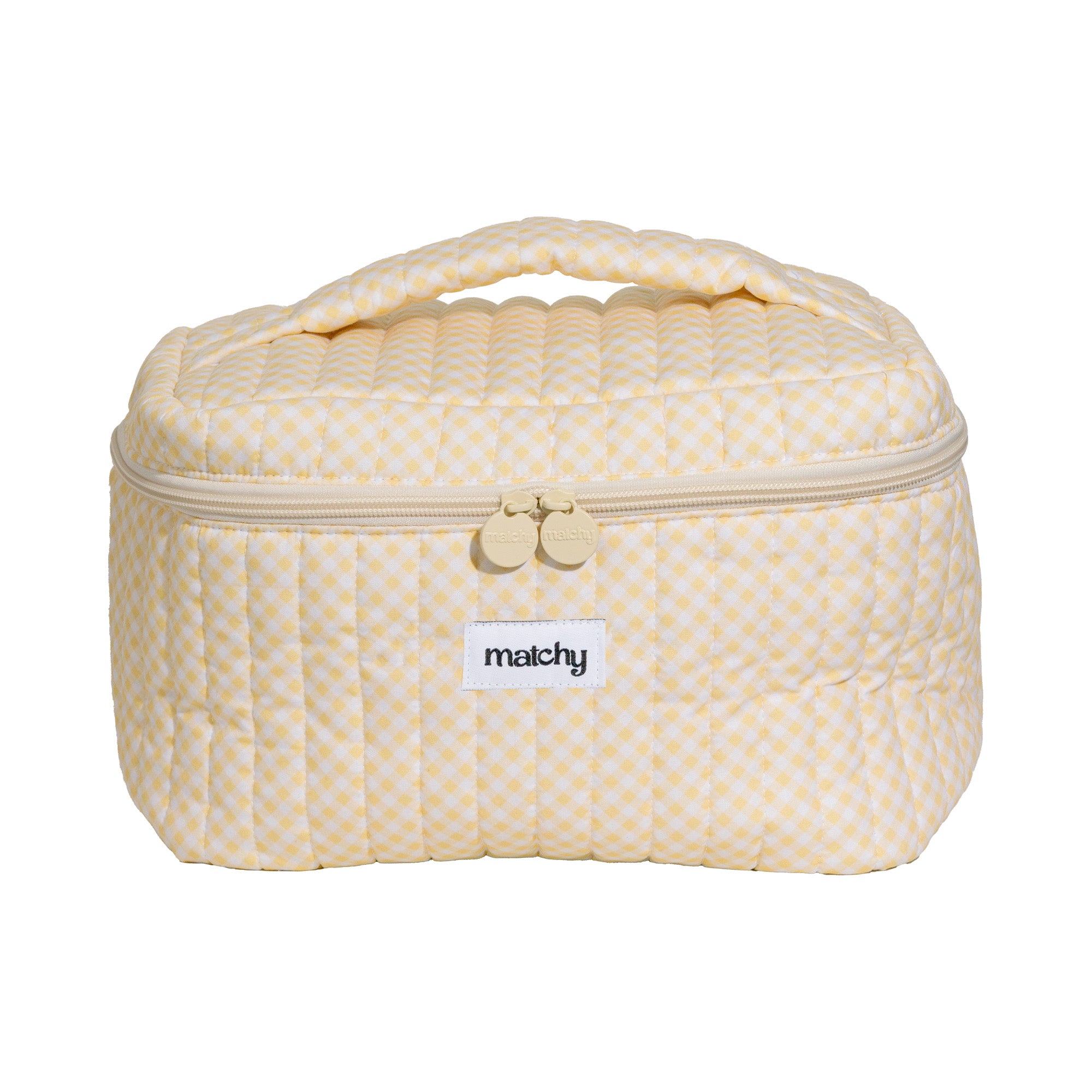 Front view of a butter yellow quilted gingham train case with gold zip pulls and a 'matchy' label. Matchy Georgina Train Case in yellow gingham.